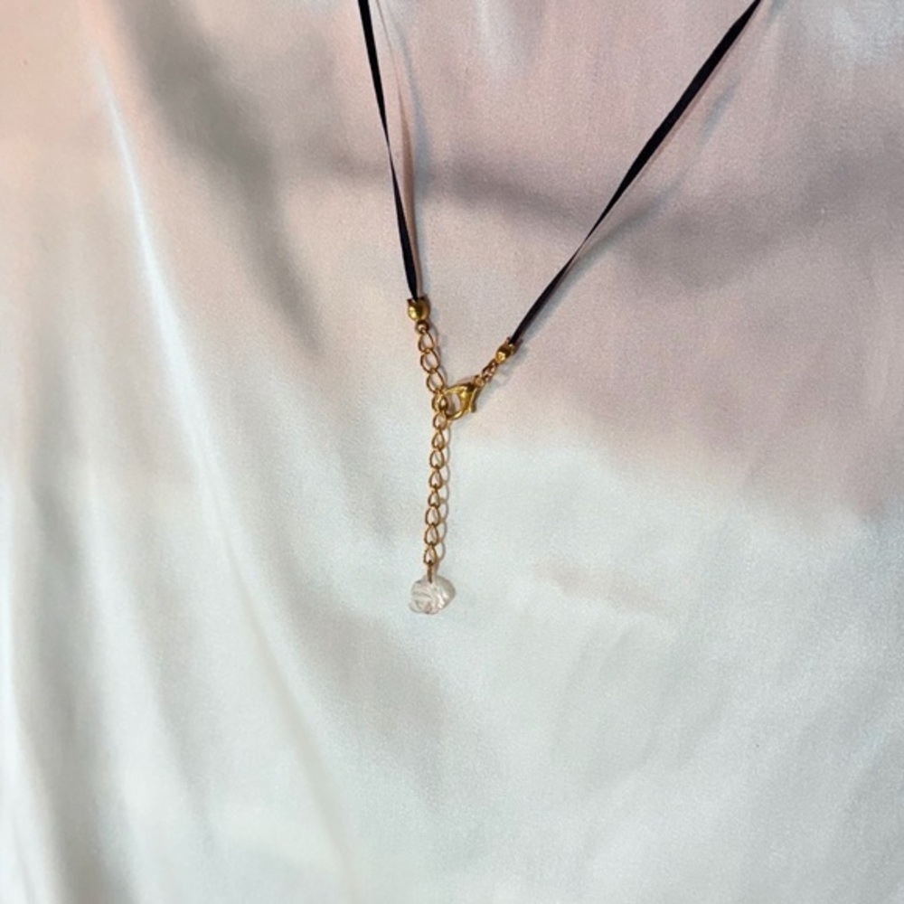 Black and gold with a clear quartz rose necklace